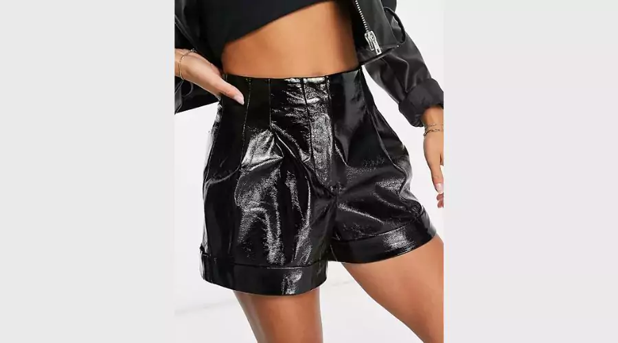 River Island Petite faux leather shorts with a black patent finish